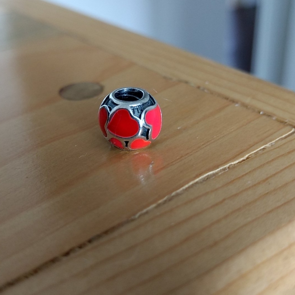 Pandora infinite red hearts charm